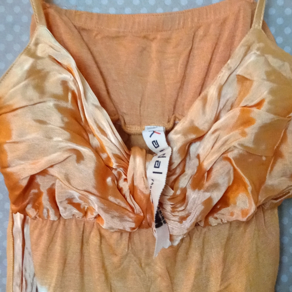 Silk top frame ties in the back straps adjustable